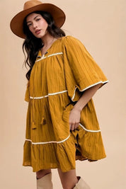 Mustard Annie Wear Tassel Contrast Trim Tie Neck Half Sleeve Tiered Dress | Mini Dresses Daverri Fashions