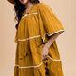 Annie Wear Tassel Contrast Trim Tie Neck Half Sleeve Tiered Dress - DAVERRI FASHIONS