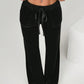 Daverri Velvet Flare Pants with drawstring waist black velvet wide-leg front pockets