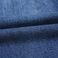 Dark blue denim with textured woven pattern in Daverri jeans