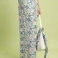 Umgee beige linen wide-leg pants with blue botanical print and raw frayed hems