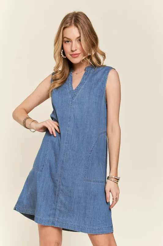 ADORA notched sleeveless denim dress with v-neckline and pockets
