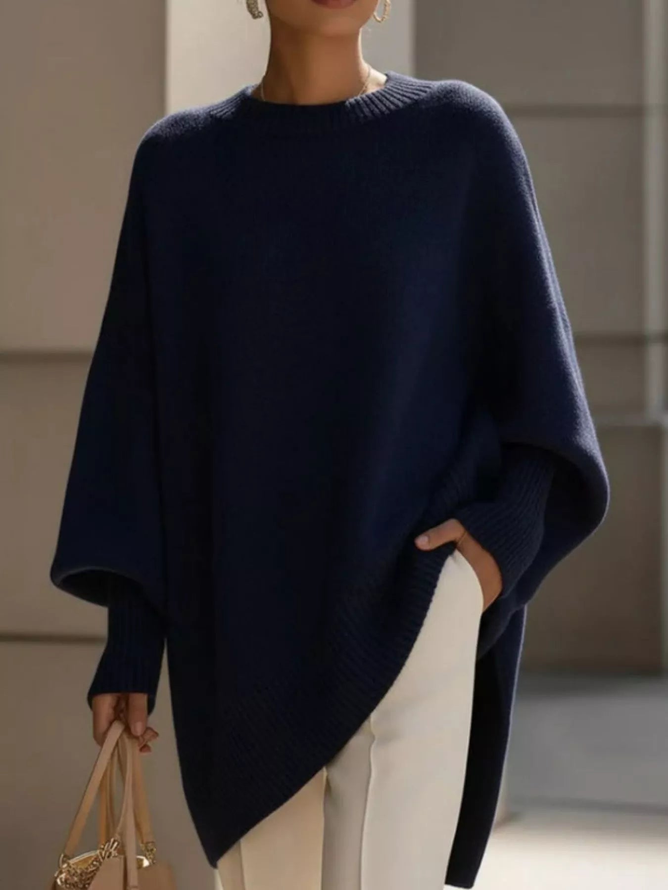 Navy blue oversized batwing sleeve knit sweater with ribbed neckline