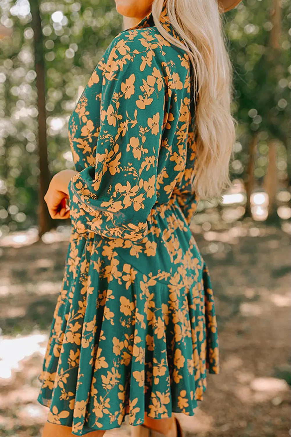 Green floral print wrap mini dress with ruffled hem and long sleeves