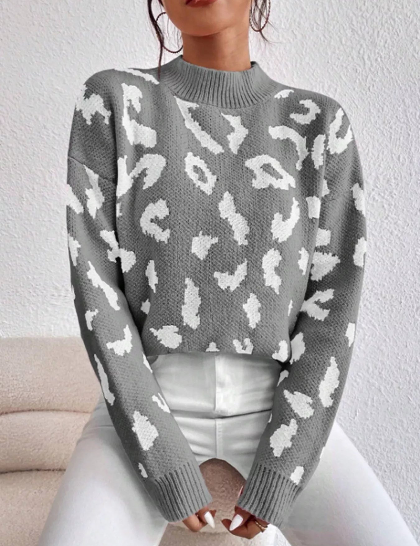 Grey and white leopard print mock neck sweater with long sleeves