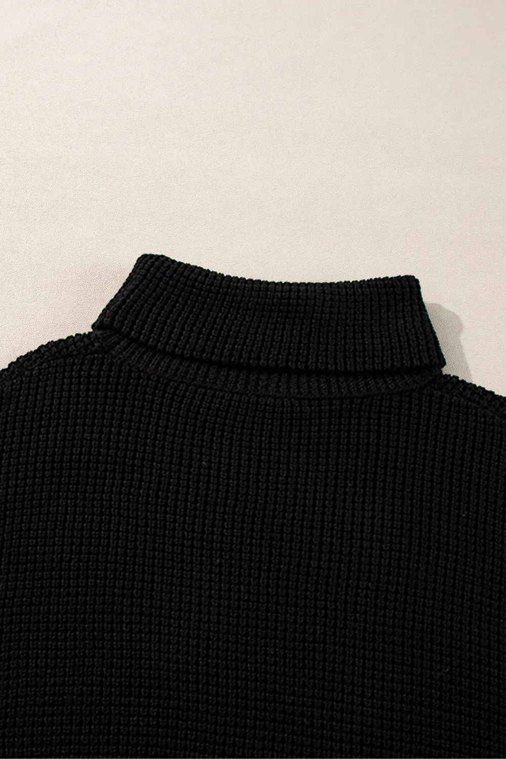 Black ribbed waffle knit turtleneck dropped shoulder sweater