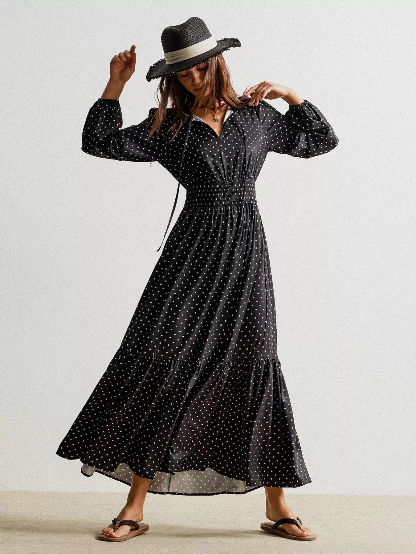Black polka dot long sleeve maxi dress with ruffled hem