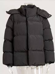 Black hooded puffer jacket with pockets, zip-up, shoulder pads
