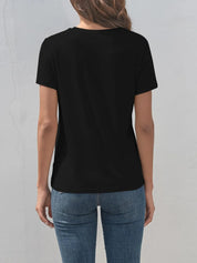 Black short-sleeved round neck t-shirt with letter graphic and jeans