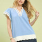 Umgee light blue short-sleeve top with white scallop trim and black V-neck stitching