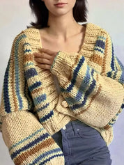 Cozy chunky knit striped cropped cardigan in cream, navy, and brown
