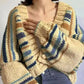 Cozy chunky knit striped cropped cardigan in cream, navy, and brown