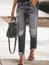 Distressed wash ankle jeans with frayed hems and ripped knees