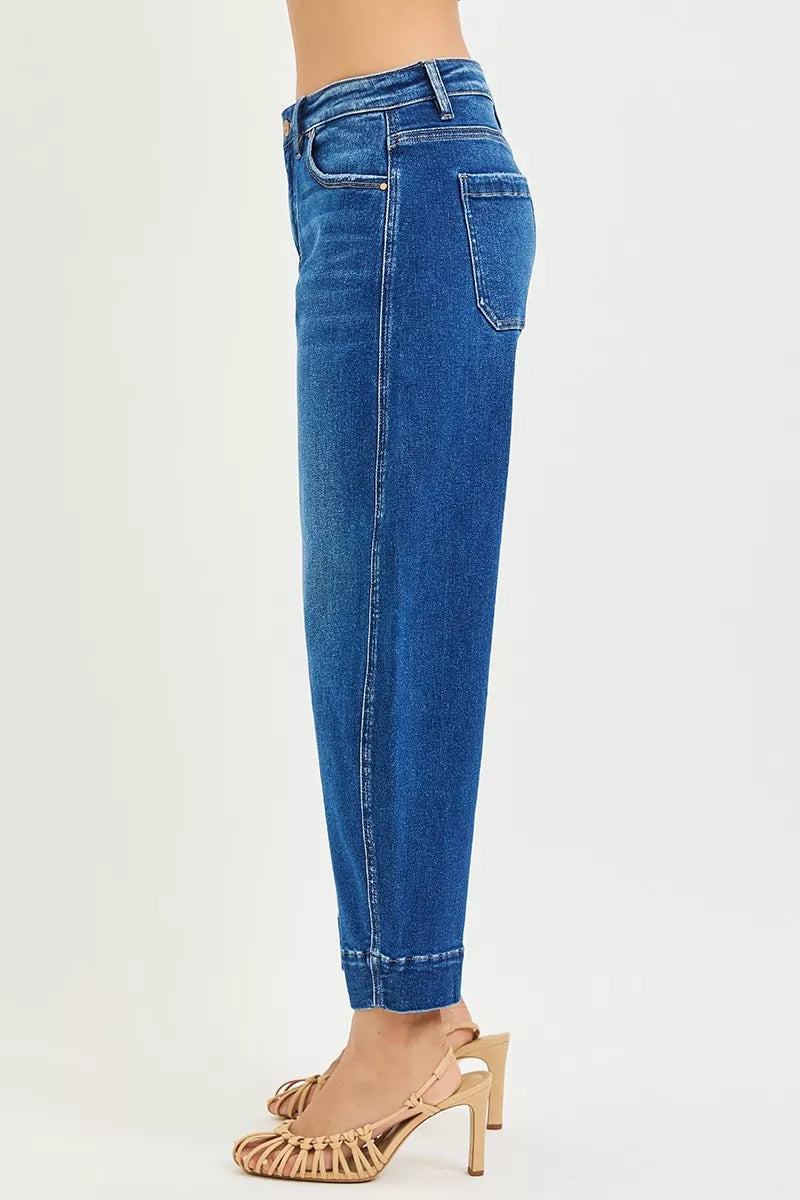RISEN Mid Rise Crop Barrel Jeans in blue denim with high waist and cuffed ankles