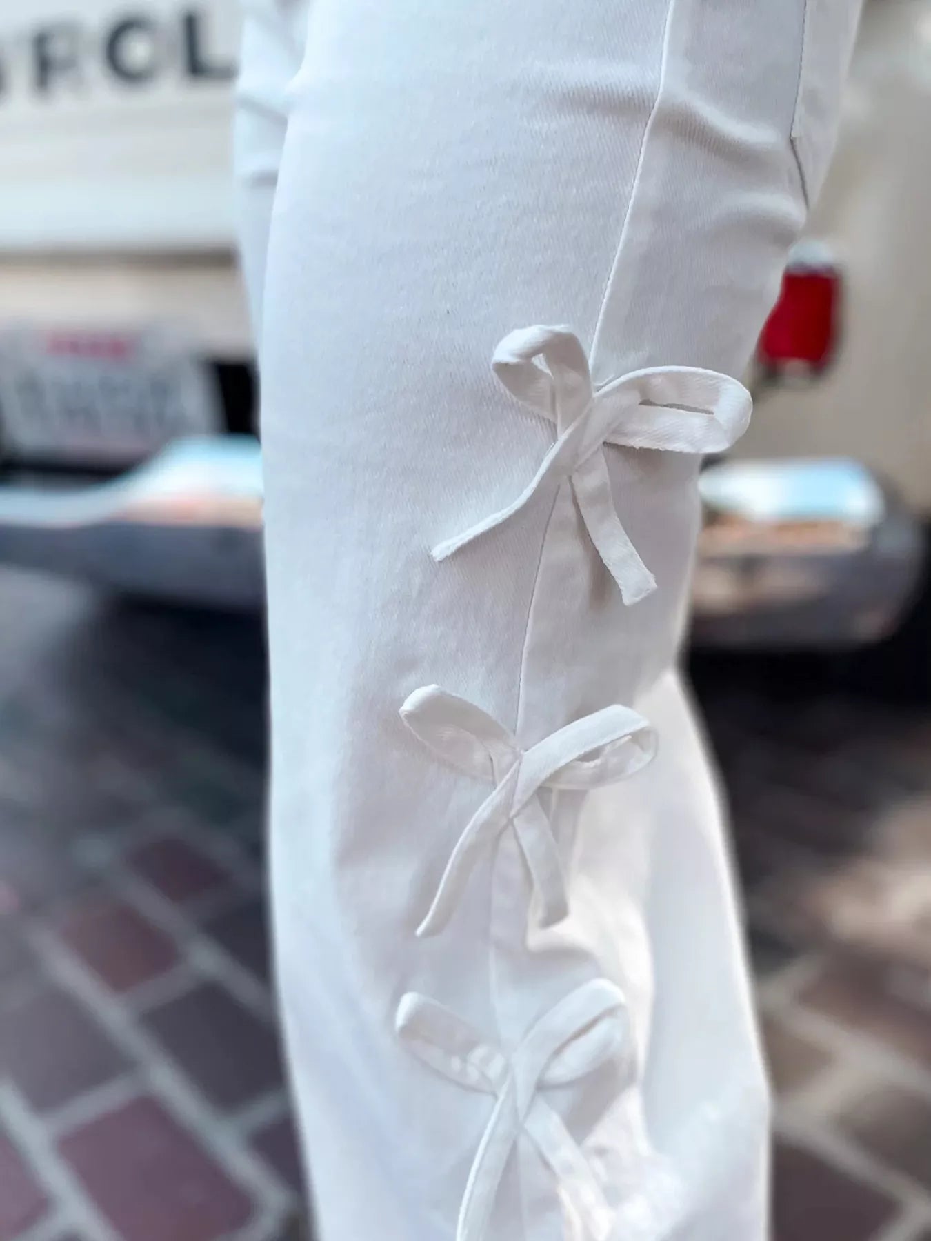 Daverri Fashions white lace-up wide-leg pants with bow ties