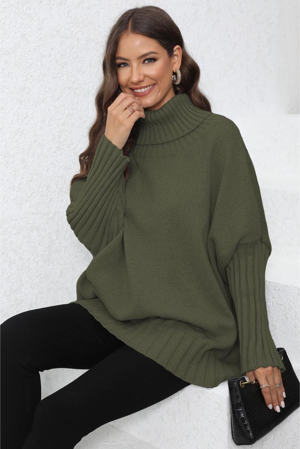 Olive green turtleneck sweater with ribbed detailing and balloon sleeves