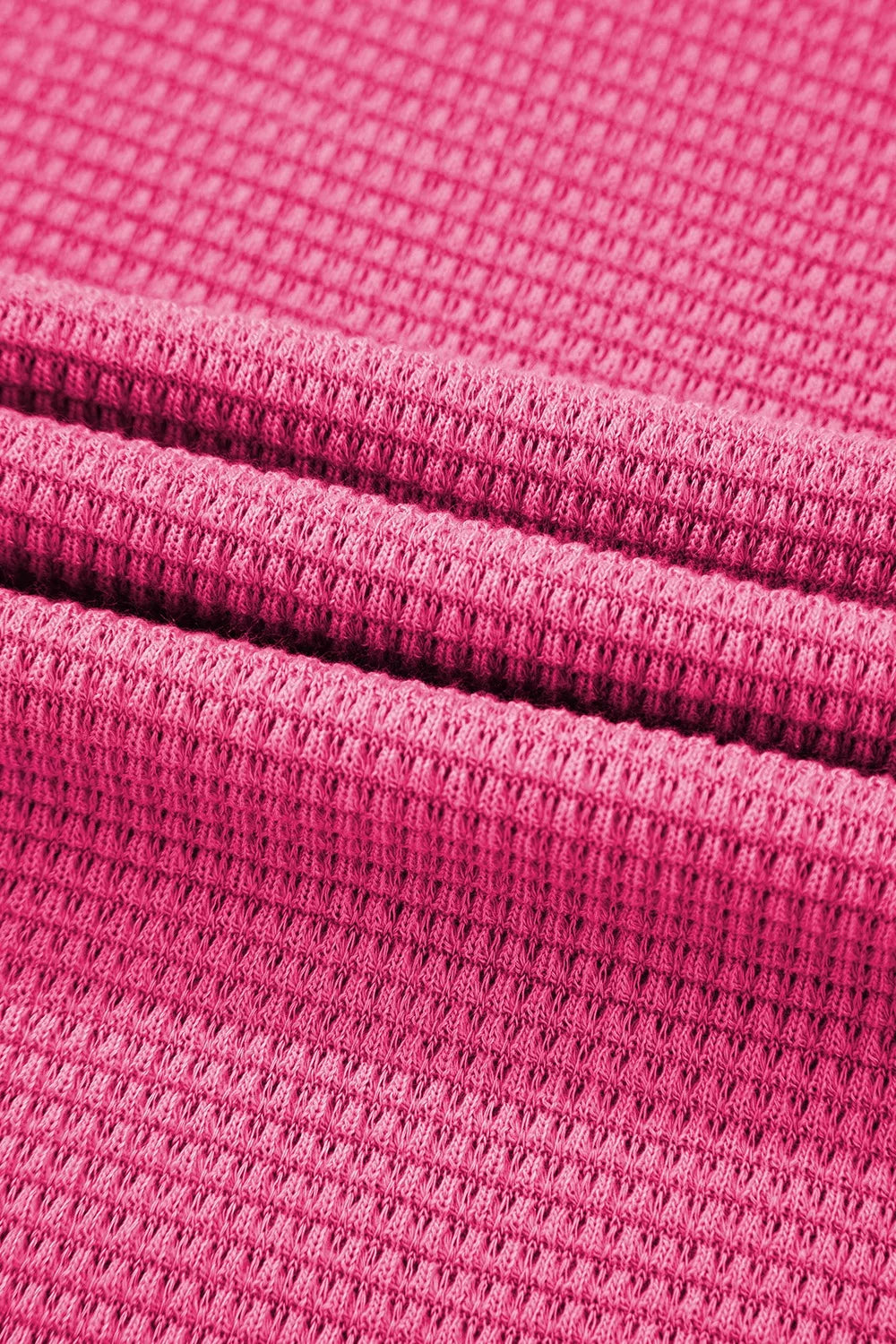 Vibrant pink waffle-knit textured fabric in solid color buttoned shirt and pants set