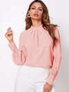 Soft pink ruched mock neck long sleeve blouse with gathered collar
