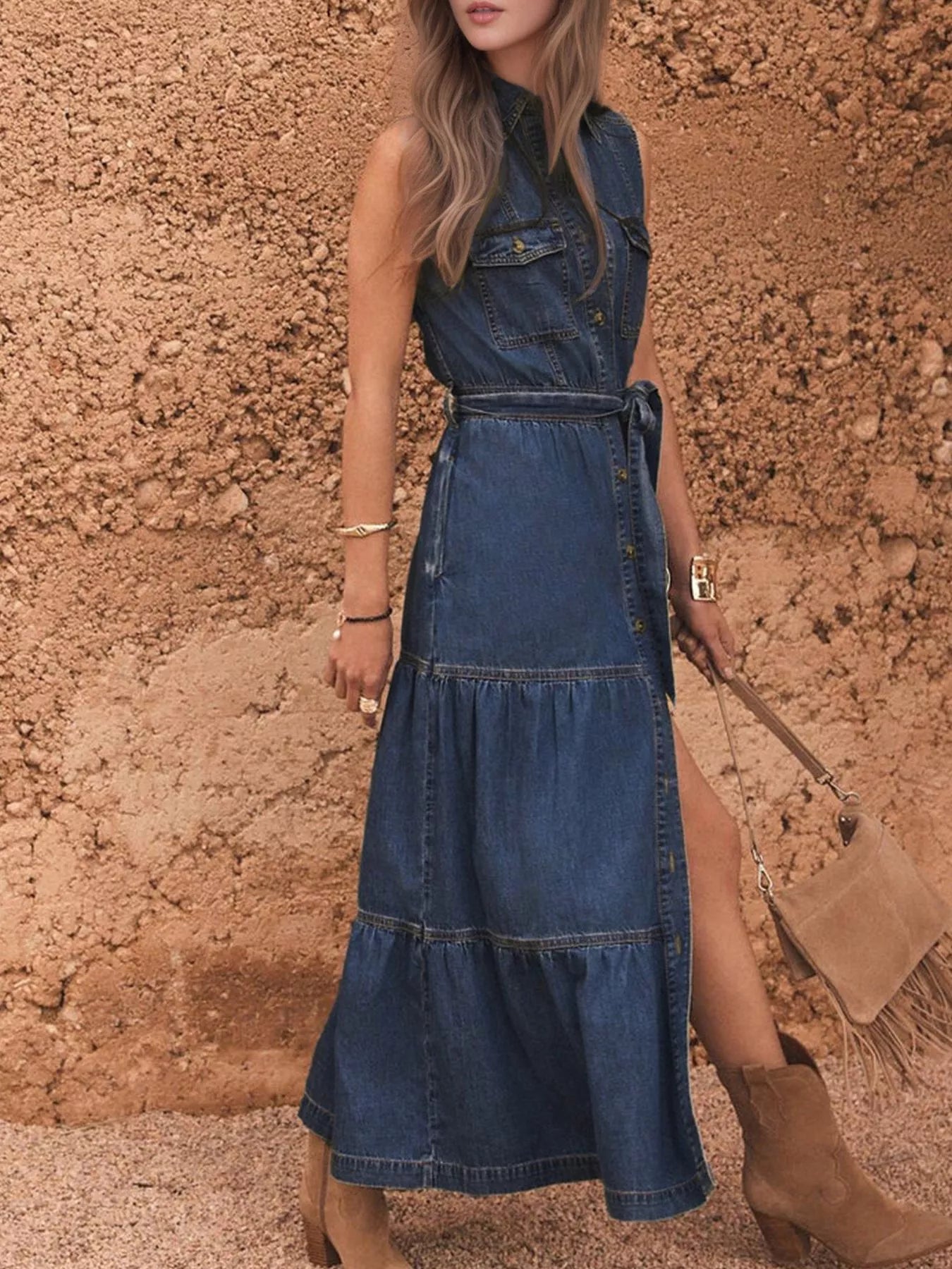 Button front sleeveless denim dress in mid-blue with tiered skirt