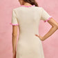 SO ME cream ribbed knit mini dress with pink ruffle trim