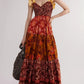 Floral tiered maxi dress in red orange floral print with yellow ruffles