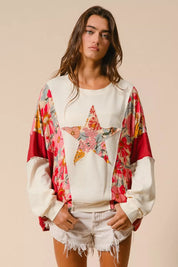 BiBi floral star sweatshirt with bell sleeves and denim shorts
