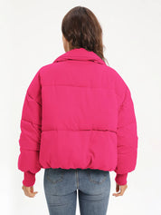 Hot pink zip-up turtleneck puffer jacket with hood