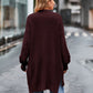 Cozy maroon long sleeve waffle-knit cardigan with relaxed fit and ribbed cuffs