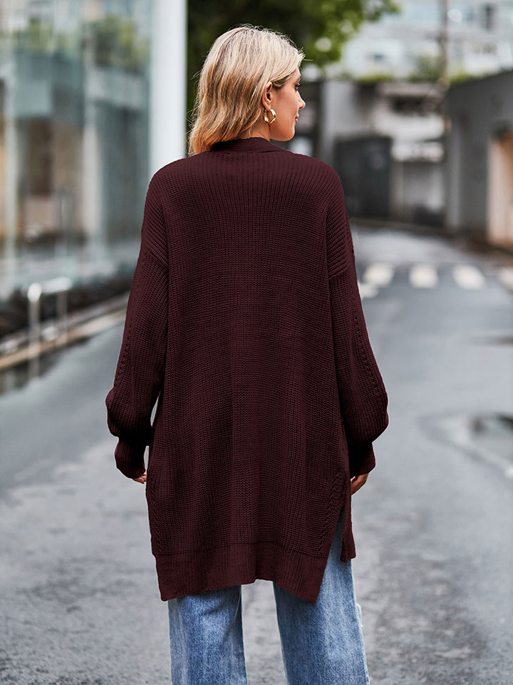 Cozy maroon long sleeve waffle-knit cardigan with relaxed fit and ribbed cuffs