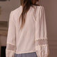 White lace trim V-neck blouse with delicate cuffs and puffed sleeves