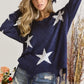 Navy blue ADORA Distressed Star Sweater Top with frayed edges