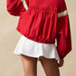Vibrant red half snap drawstring hem sweatshirt with white reflective sleeve stripes