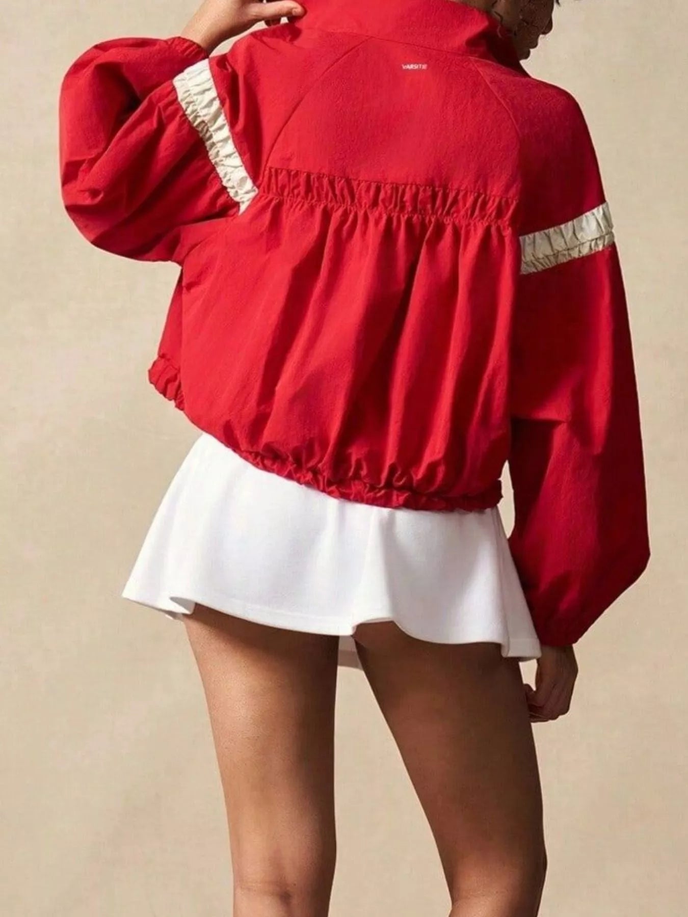 Vibrant red half snap drawstring hem sweatshirt with white reflective sleeve stripes