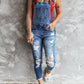 Daverri wide strap distressed denim overalls with rolled cuffs