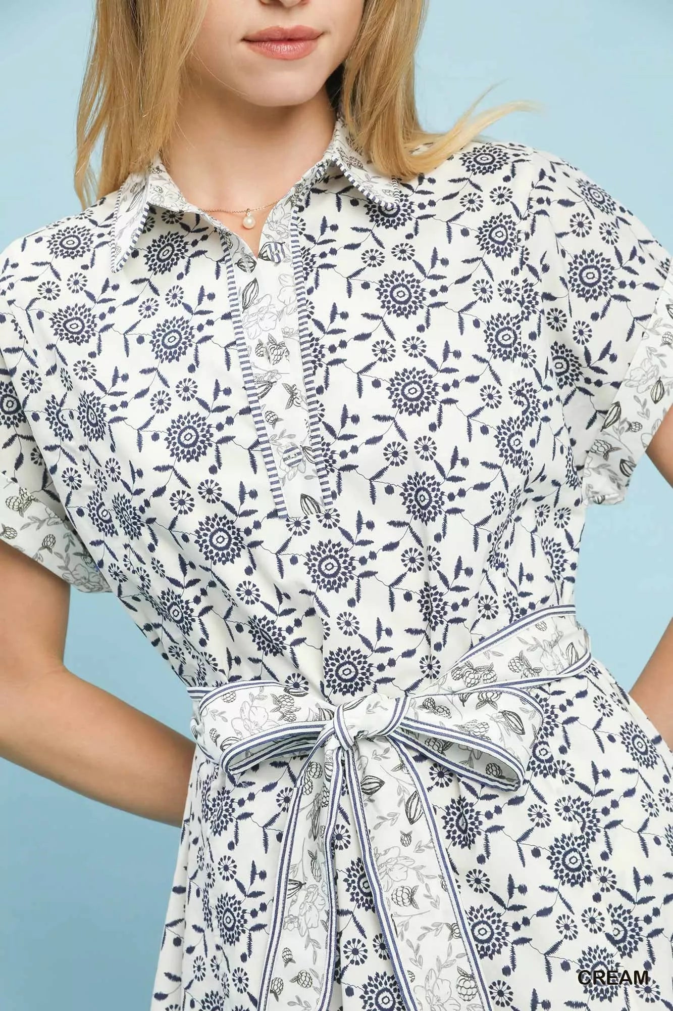 Umgee Border Print Belted Shirt Dress in white with navy floral pattern