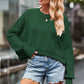 Green oversized knit sweater with round neck and drop shoulders