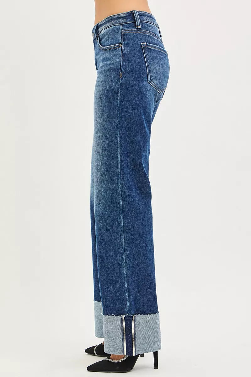 Blue denim high-rise wide-leg jeans with rolled cuffs and striped hem