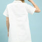 Cream-colored Umgee eyelet short sleeve shift dress with pocket