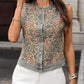 Daverri floral embroidered sleeveless denim vest on beige background