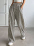 Daverri striped high-waisted wide leg pants in black beige stripes