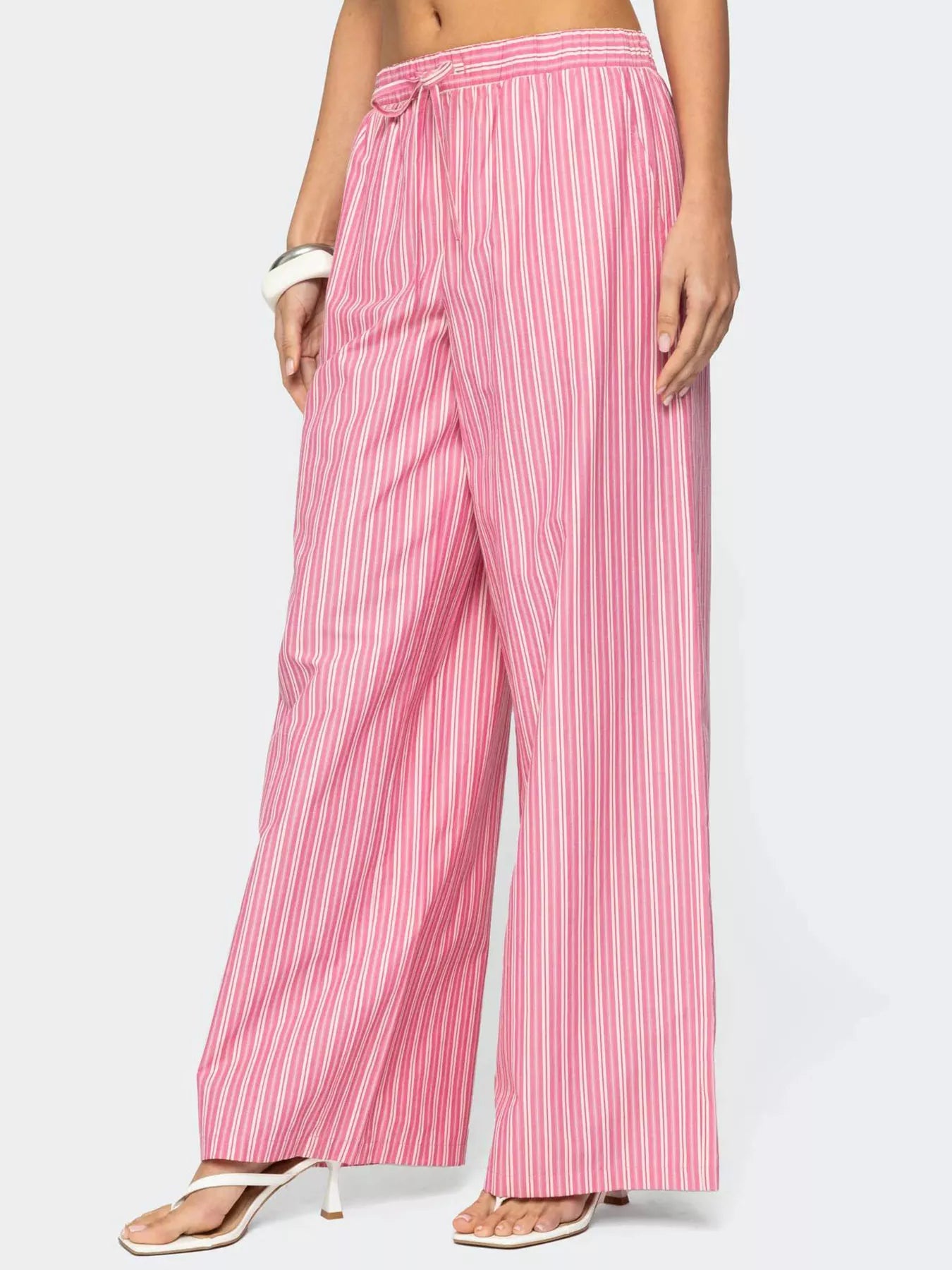Pink and white striped wide-leg pants with drawstring waist and pockets