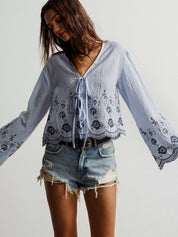 Light blue boho floral embroidered tie-front blouse