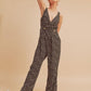 Aemi + Co Ditsy Floral Surplice Sleeveless Wide Leg Jumpsuit Jumpsuits