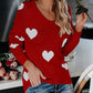 Red long-sleeved Heart Scoop Neck Sweater with white heart patterns