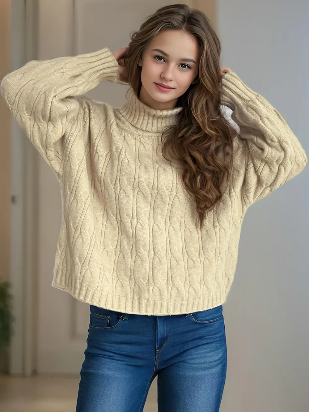 Cream cable-knit turtleneck sweater with ribbed cuffs