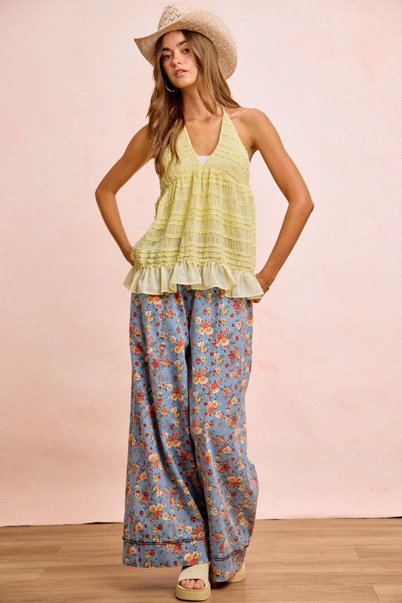 Light green ruffled halter top with BiBi floral pants