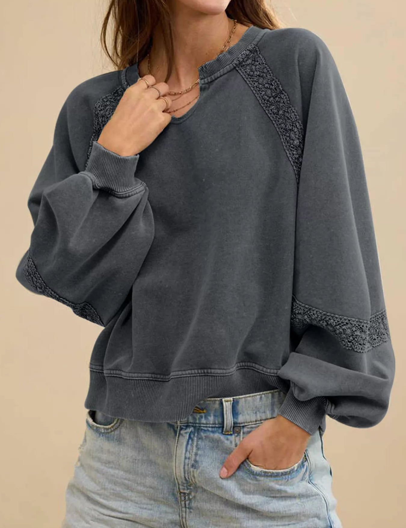 Charcoal gray mineral wash sweatshirt with lace patchwork details
