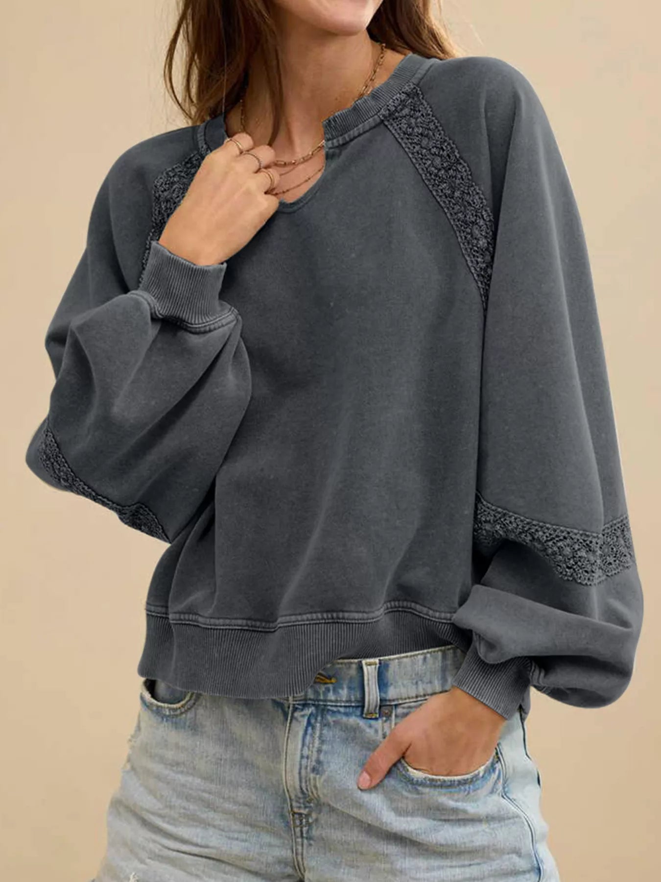 Charcoal gray mineral wash sweatshirt with lace patchwork details