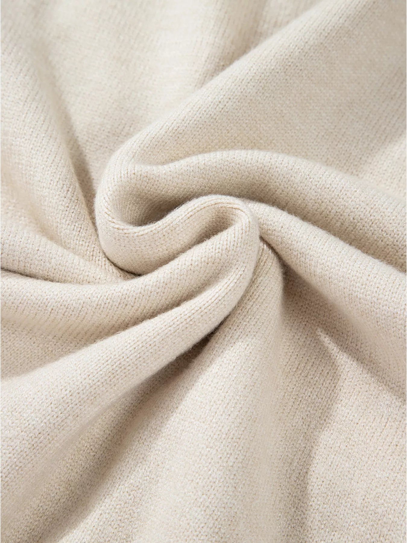Cream-colored plush throw blanket in Flower Stitching Mock Neck Sweater