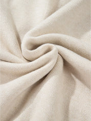 Cream-colored plush throw blanket in Flower Stitching Mock Neck Sweater